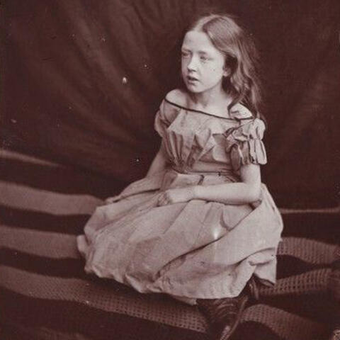Photo of seated girl