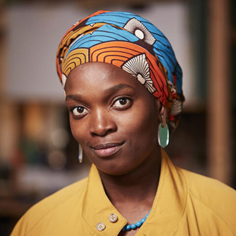 Photo of woman with patterned headscarf
