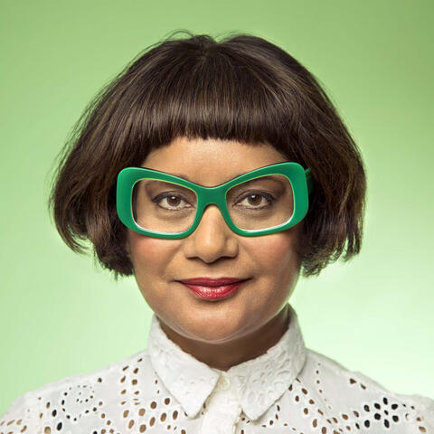 Photo of woman with green glasses